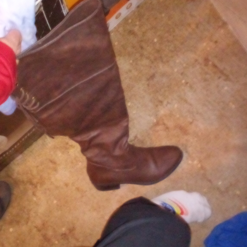 Brown long above knee knee-high leather boots